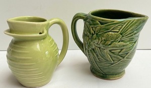 lot 110 image: Two Vintage Pottery Pitchers including a Vintage Unmarked McCoy Pottery Pitcher