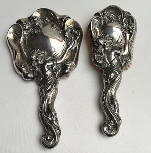 lot 106 image: Antique Art Nouveau Silver Overlay Vanity Brush and Mirror Set