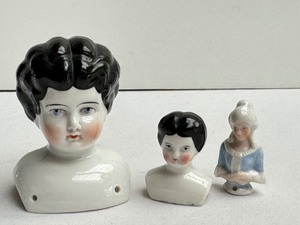 lot 157 image: Three Vintage China Doll Heads
