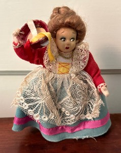 lot 379 image: Pretty Vintage Doll with Late Lenchi Type Wool Skirt with Lace Apron