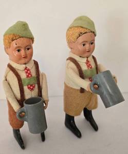 lot 502 image: Whimsical German Windup Tin Beer-Drinking Boy Dolls