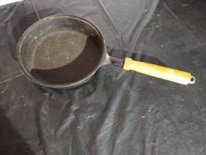 lot 145 image: Small Unmarked Cast Iron Skillet With Wood Handle