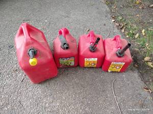 lot 178 image: (4) Gas Cans