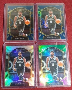 lot 215 image: (4) Kyrie Irving Select Variation Cards - (3) Prizms