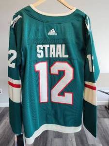 Minnesota Wild Eric Staal Size XL Adidas Hockey Jersey with a Framed Photo of a Minnesota Wild Player