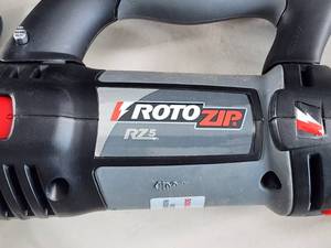 Roto Zip Electric Power Tool with Cutting Blade Attachment