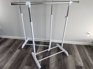 (2) Rolling Lightweight Garment Hangers