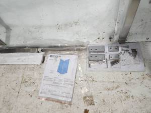 Delta square frameless shower enclosure