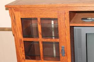 lot 9 image: Wooden TV Cabinet with Glass Panel Doors and Storage