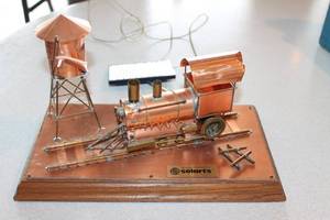 lot 32 image: Solarts Solar Powered Copper Model Train & Water Tower