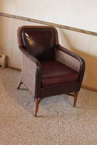 lot 34 image: Vintage Wicker and Leather Armchair
