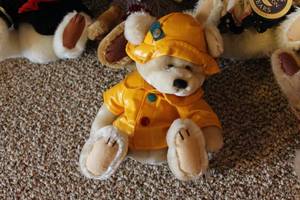 lot 72 image: Collection of Brass Button Bears with Vintage Outfits