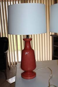 lot 83 image: Pair of Orange Table Lamps with White Shades