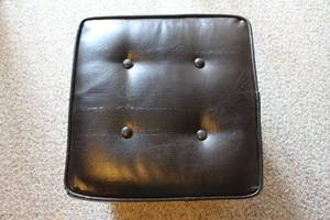 lot 90 image: Black Leather Ottoman with Button-Tufted Design