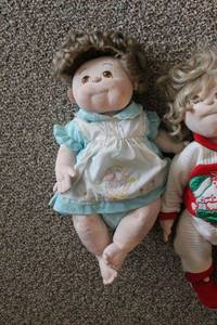 lot 92 image: Lot of 3 Holiday and Baby Dolls