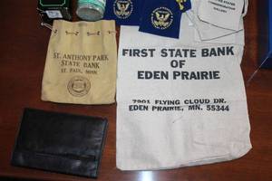 lot 95 image: Collection of Bank Money Bags, Coin Storage Boxes, and Currency
