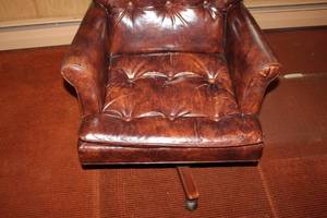 lot 106 image: Vintage Leather Tufted Recliner with Casters