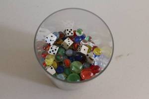 lot 148 image: Lot of Assorted Marbles and Dice in Glass Jar