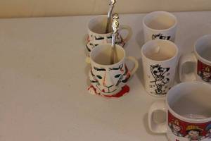 lot 153 image: Collection of Vintage and Character Mugs with Spoons
