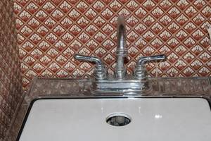 lot 232 image: Vintage Utility Sink with Faucet and Storage Cabinet