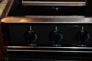 lot A-240 image: Kenmore Gas Range and Oven - Black