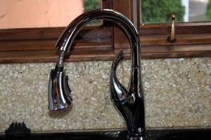 lot 242 image: Modern Black Double-Basin Kitchen Sink with Pull-Down Faucet