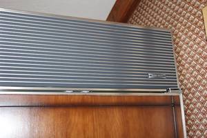 lot A-243 image: Sub-Zero Built-In Refrigerator with Wood Panel Doors