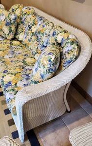 lot 1 image: Wicker Lloyd Loom Sofa