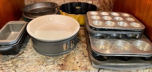 lot 18 image: Twenty-Six Piece Baking LOT - cupcake Tins, Cheesecake Pan, Bundt Cake, Mini Loaf