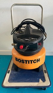 lot 35 image: Bostitch 6 Gallon Air Compressor and Haul Master 4-Wheel Cart
