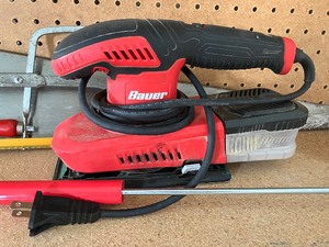 lot 36 image: LOT Bauer Sander, Three Hand Saws and a Drain Snake