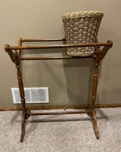 lot 143 image: Wood Quilt Rack and Wicker Basket