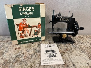 lot 171 image: Vintage Singer Sew Handy Childrens Sewing Machine and Box