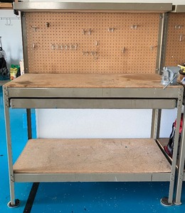 lot 28 image: 1 of 3 Metal Workbench with Pegboard and 4 Vice