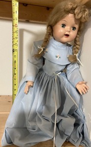 lot 193 image: Vintage Doll Blue Dress with Stand