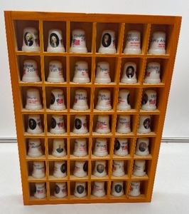 lot 10 image: Lot of 42 Presidential Thimbles with display case