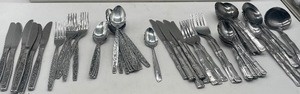 lot 34 image: MCM Miscellaneous Stainless Flatware Lot Northland Bamboo and LaSpana Floral
