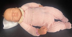 lot 62 image: Soft Body Realistic Baby Doll Emily with Bracelet 20 Reborn Doll