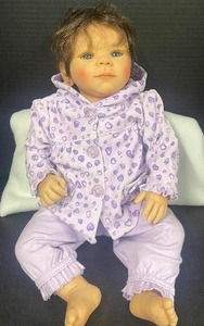 lot 66 image: Laura Tuzlo-Ross Artist 20 Soft Body Realistic Baby Doll Brown Hair Blue Eyes Reborn Doll