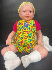 lot 68 image: Soft Body Realistic Baby Doll 24 GreyHazel Eyes with White Blonde Hair, Pierced Ears, Tongue Out Reborn Doll