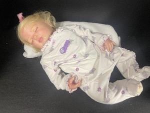 lot 70 image: Soft Body 18 Realistic Baby Doll Blond Hair Closed Eyes Reborn Doll
