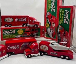 lot 129 image: Collectible Coca Cola Holiday Caravan Trucks Lot of 3 1998 2000 2001