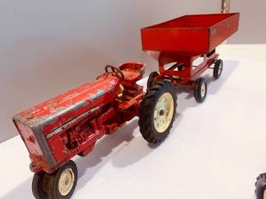 ERTL Red Toy Tractor and Wagon (8��) and Smaller Red Toy Tractor and Wagon (4��)