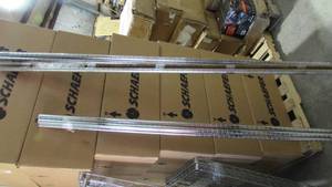 Lot of Metal Racking with Shelving Connectors and A Few Wheels
