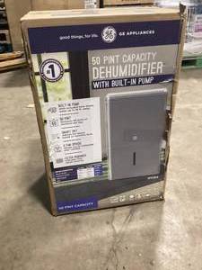 lot 36 image: GE 50-Pint Dehumidifier with Built-in Pump for Basement, Garage or Wet Rooms up to 4500 sq. ft. in GreyCustomer Returns See Pictures