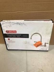 lot 45 image: Delta Foundations 2-Handle Standard Kitchen Faucet in Stainless Customer Returns See Pictures