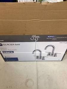 lot 46 image: Glacier Bay Dorind 4 in. Centerset 2-Handle High-Arc Bathroom Faucet in Polished Chrome (2-Pack)  Customer Returns See Pictures