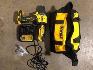DEWALT ATOMIC 20-Volt Lithium-Ion Cordless Compact 12 in. DrillDriver Kit with 2.0Ah Battery, Charger and Bag    Customer Returns See Pictures
