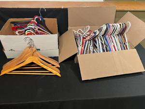 lot 217 image: Lot of Assorted Plastic and Wooden Hangers