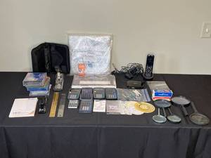 lot 265 image: Mixed Office Supply Lot - Calculators, Magnifiers, CDs, and More